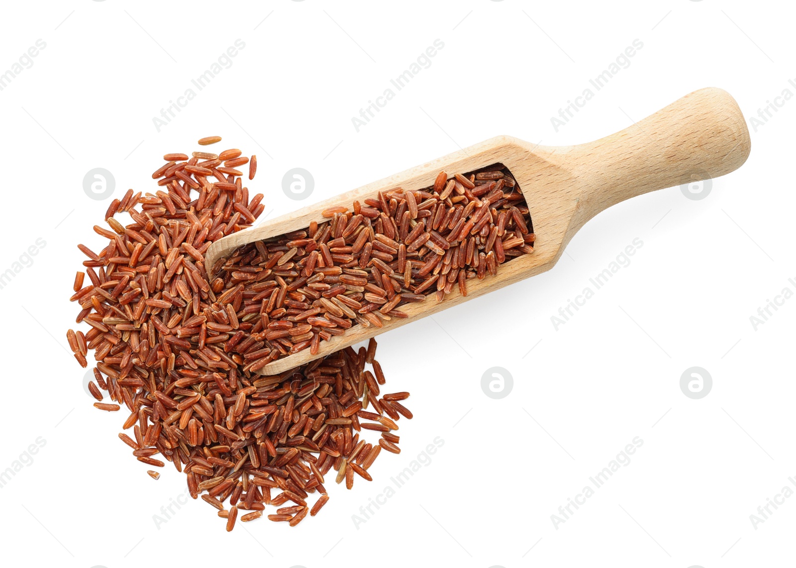 Photo of Raw brown rice and scoop isolated on white, top view