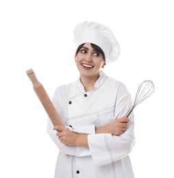 Professional chef with rolling pin and whisk on white background