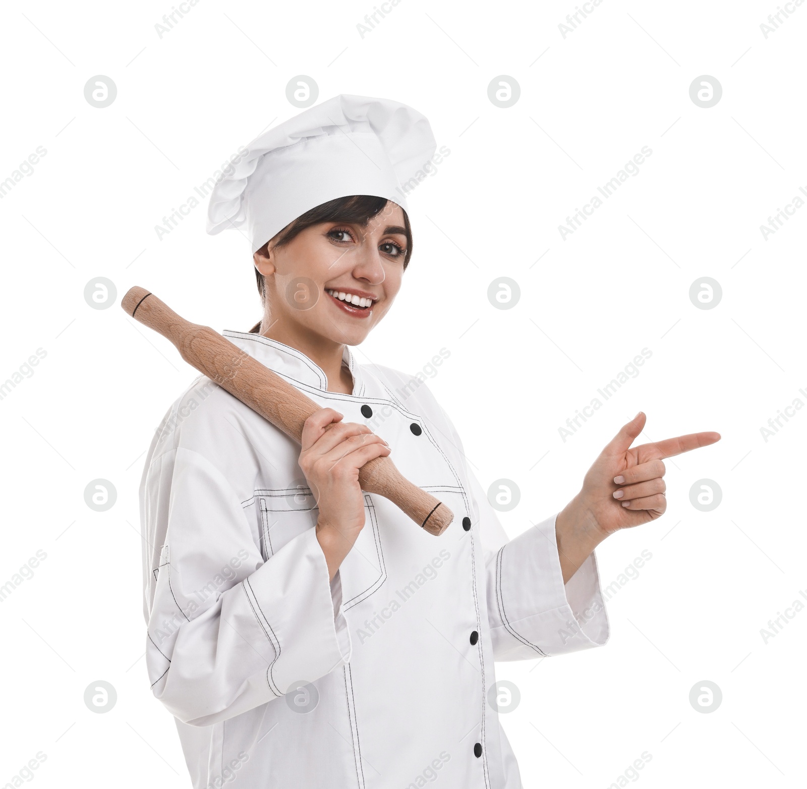 Photo of Professional chef with rolling pin pointing at something on white background