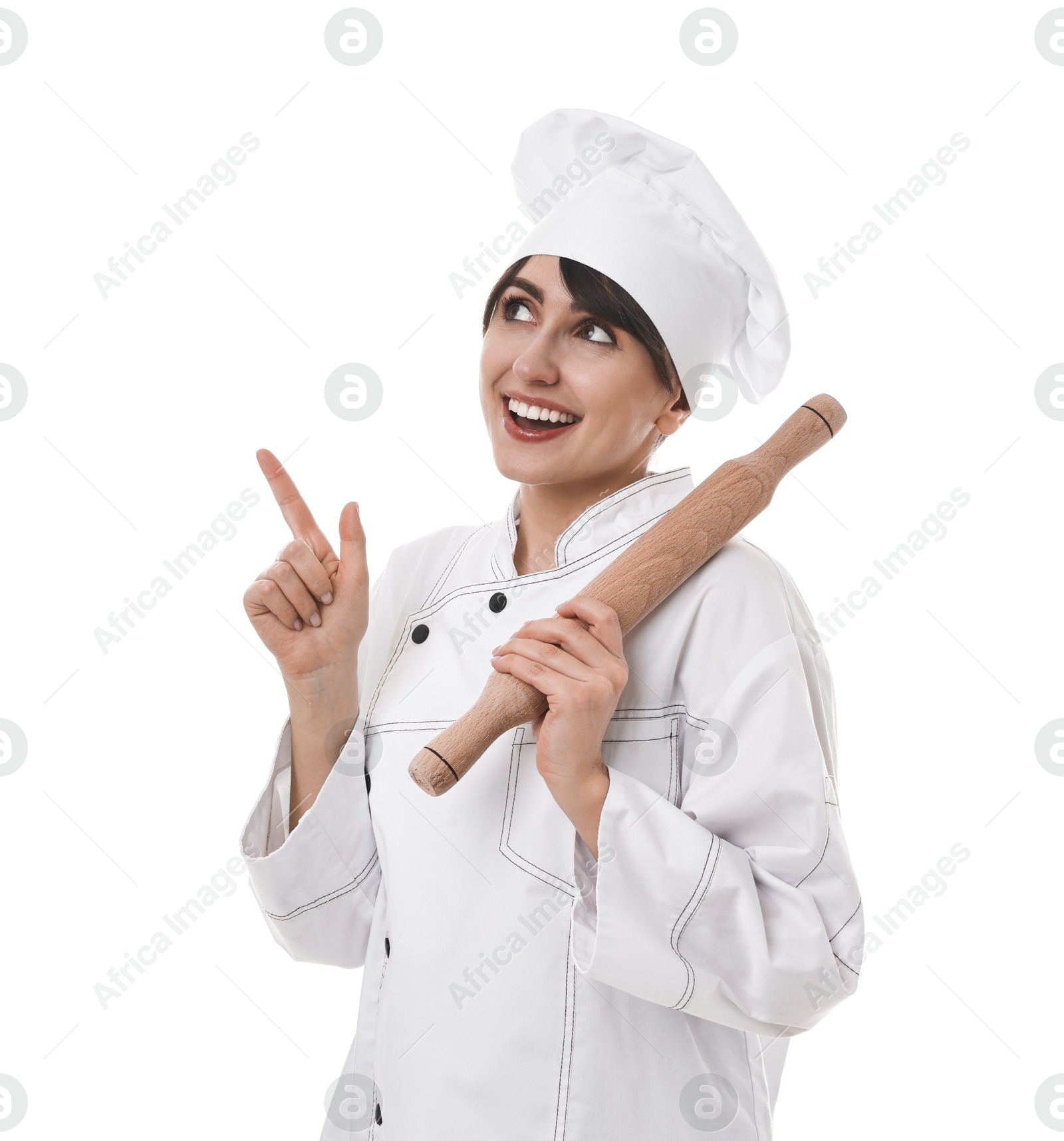 Photo of Professional chef with rolling pin pointing at something on white background