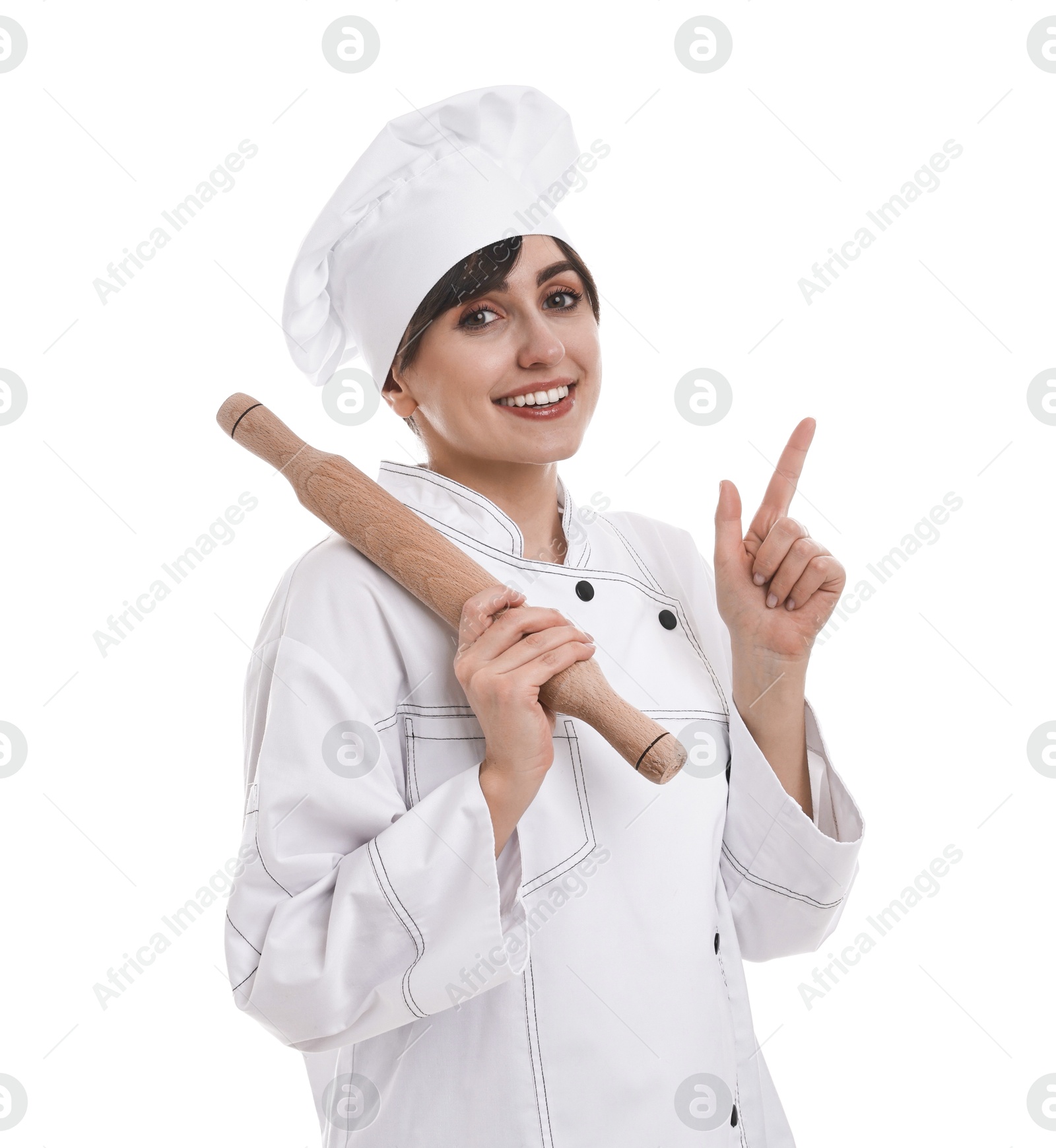 Photo of Professional chef with rolling pin pointing at something on white background