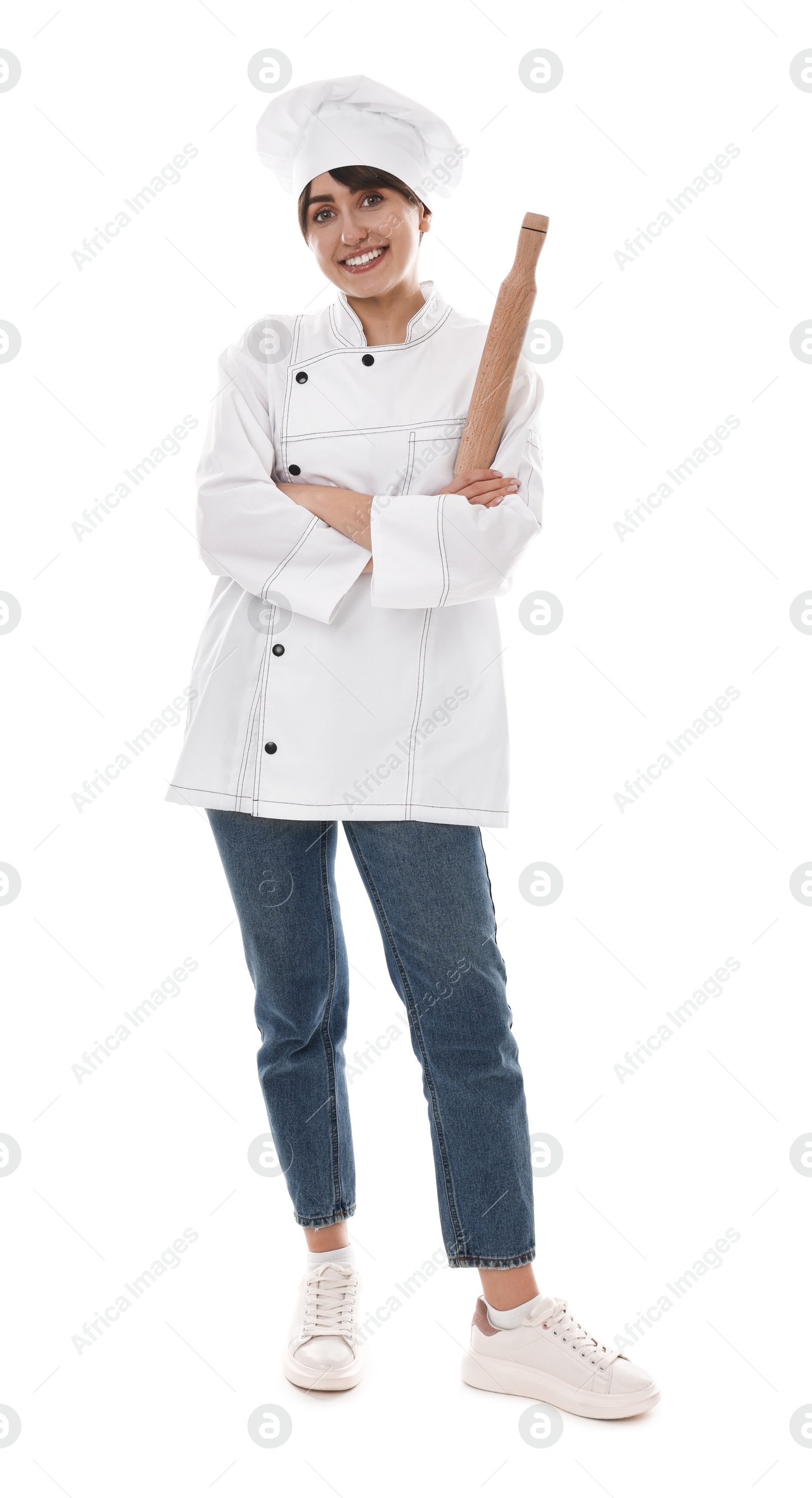 Photo of Professional chef with rolling pin on white background