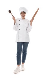 Photo of Professional chef with rolling pin and spoon on white background