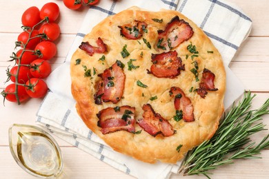 Photo of Delicious focaccia bread with bacon and parsley on white wooden table, flat lay