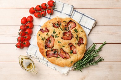 Photo of Delicious focaccia bread with bacon and parsley on white wooden table, flat lay