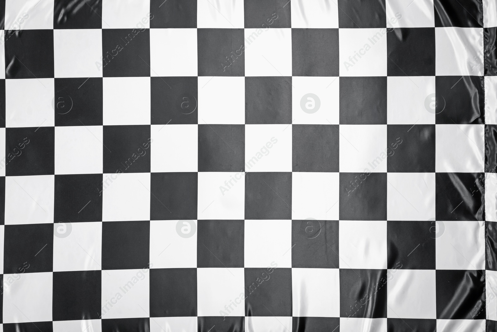 Photo of Checkered finish flag as background, top view