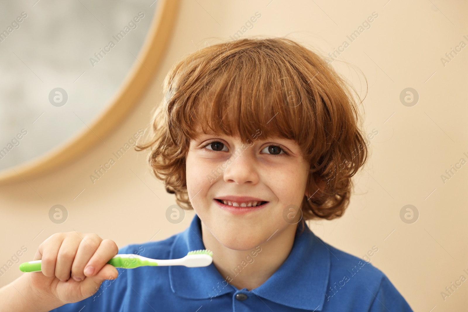 Photo of Cute boy with toothbrush at home. Personal hygiene