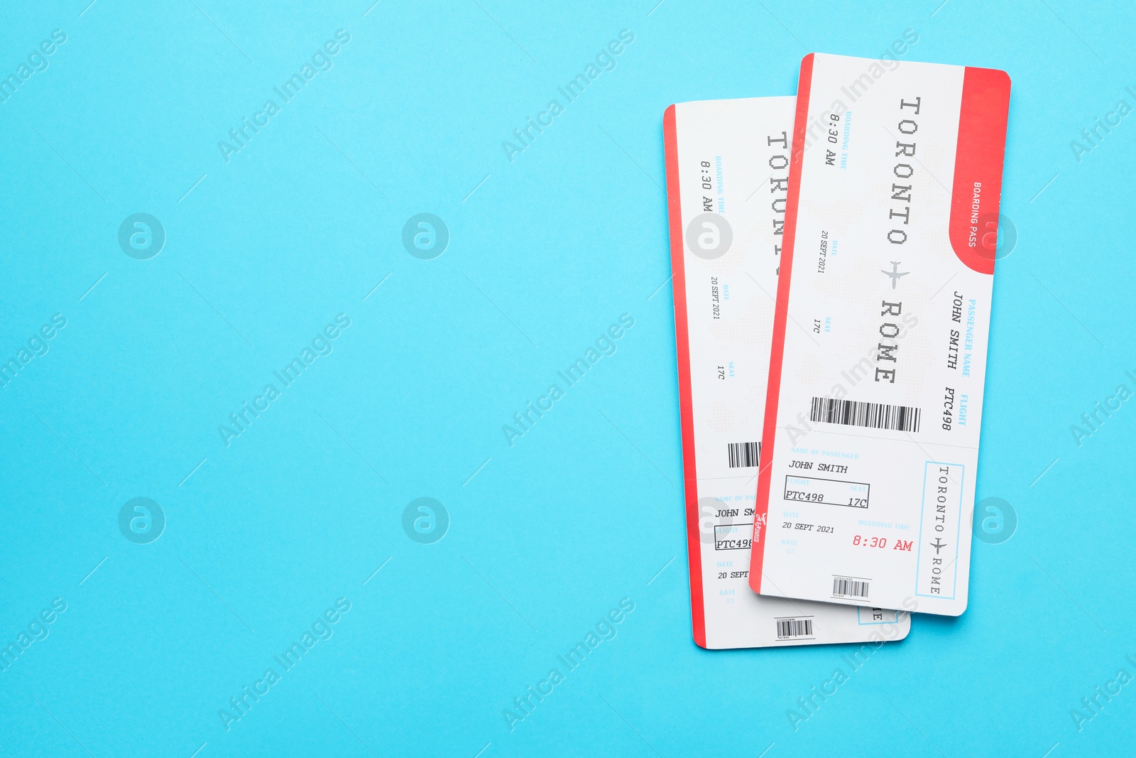 Photo of Travel agency. Flight tickets on light blue background, top view. Space for text