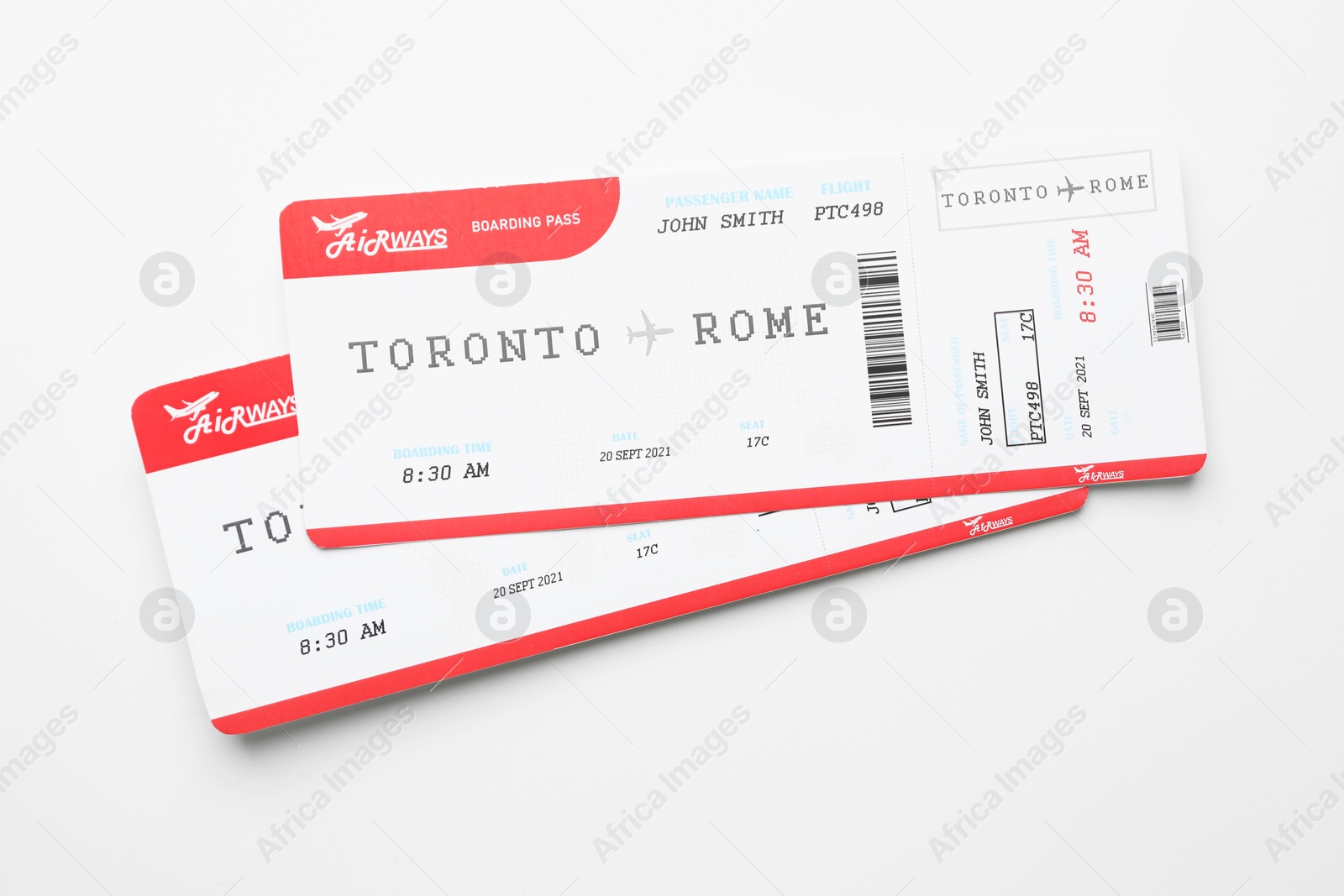 Photo of Travel agency. Flight tickets on light background, top view