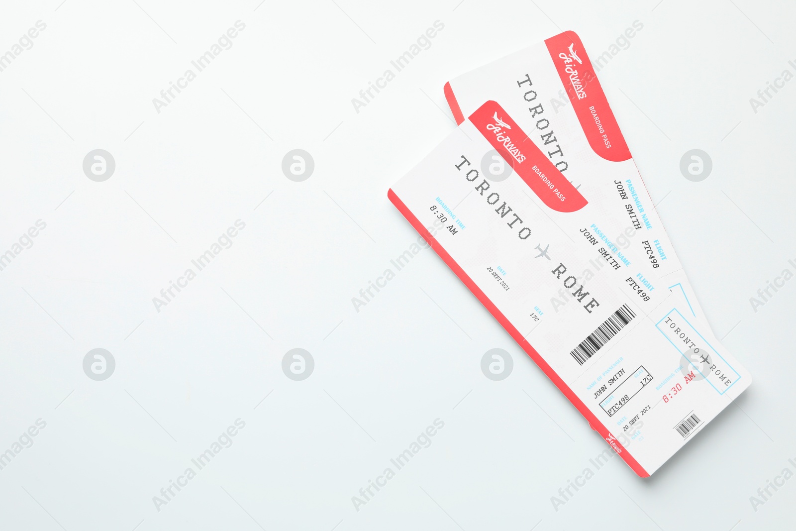 Photo of Travel agency. Flight tickets on light background, top view. Space for text