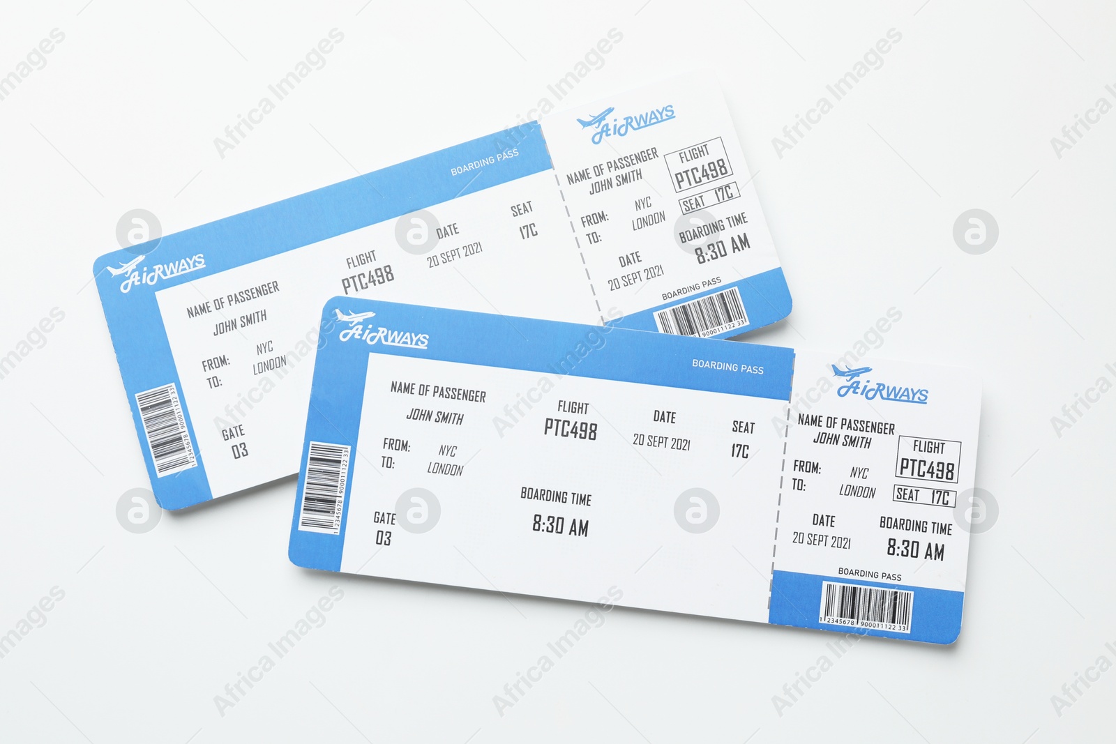 Photo of Travel agency. Flight tickets on light background, top view