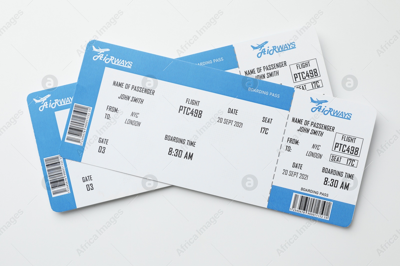 Photo of Travel agency. Flight tickets on light background, top view