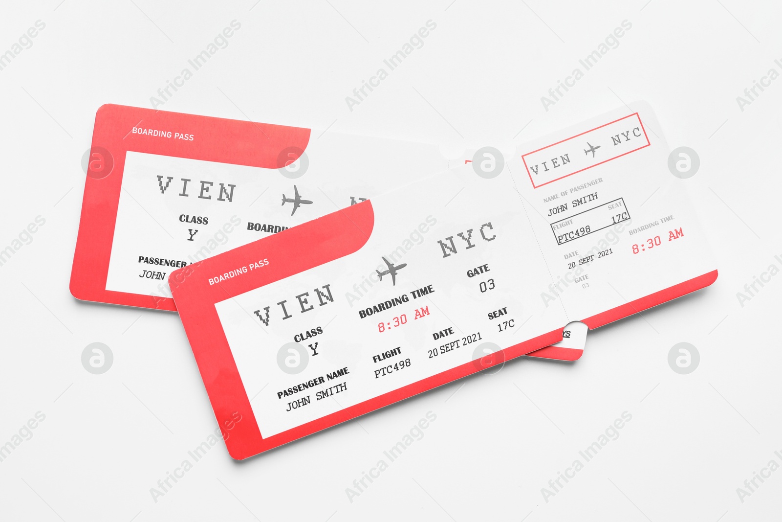 Photo of Travel agency. Flight tickets on light background, top view