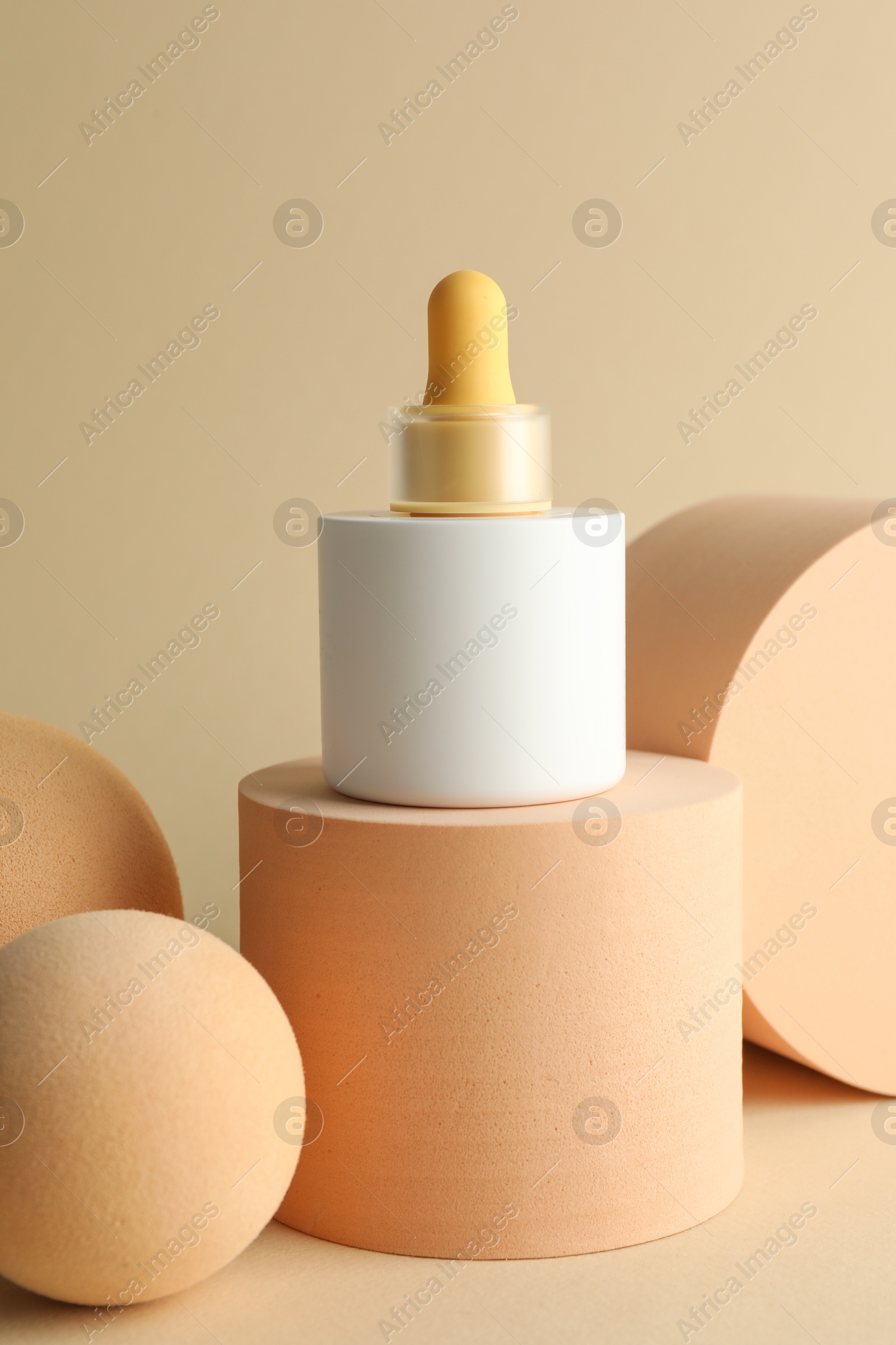 Photo of Stylish presentation of skin care product on beige background