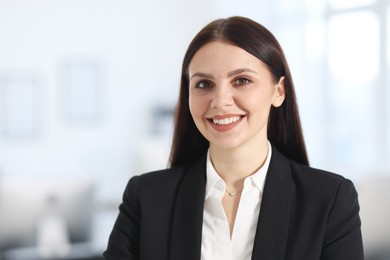 Photo of Portrait of happy banker in office, space for text