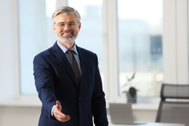 Photo of Portrait of banker in office, space for text