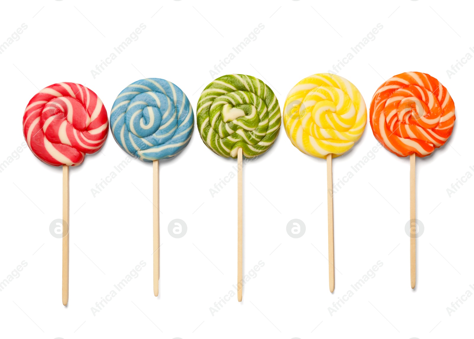 Photo of Tasty lollipops isolated on white, top view