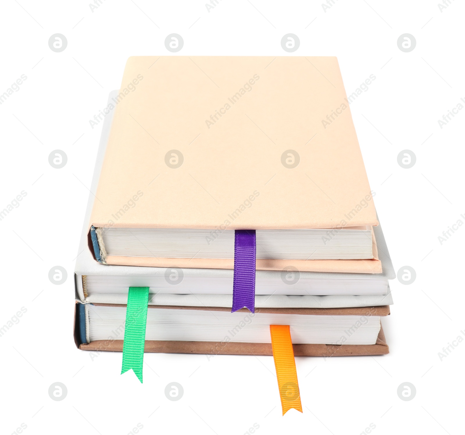 Photo of Books with ribbon bookmarks isolated on white