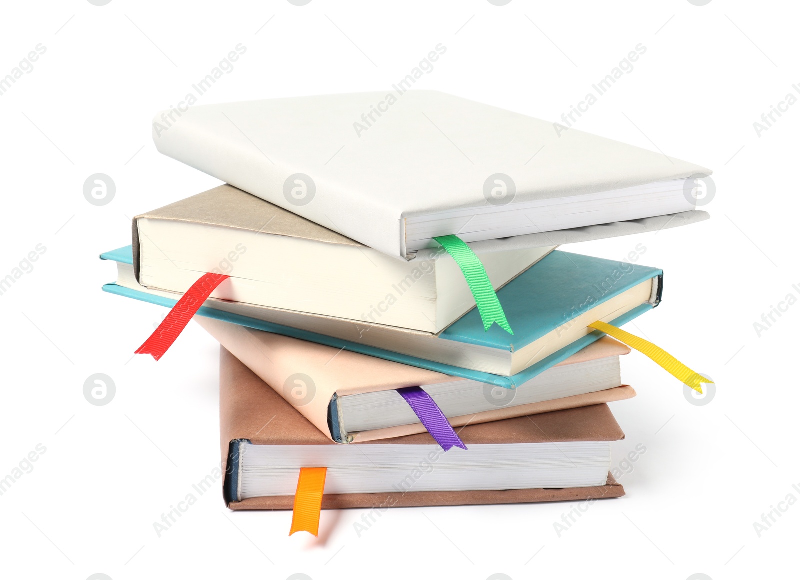 Photo of Books with ribbon bookmarks isolated on white