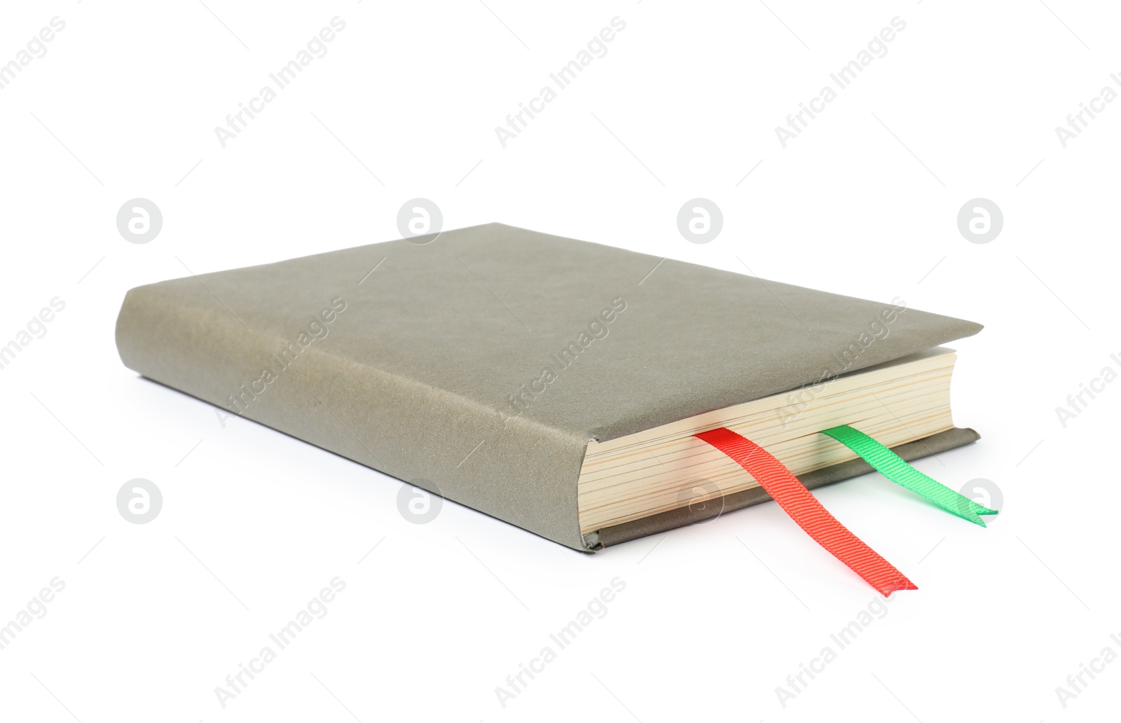 Photo of Book with ribbon bookmarks isolated on white