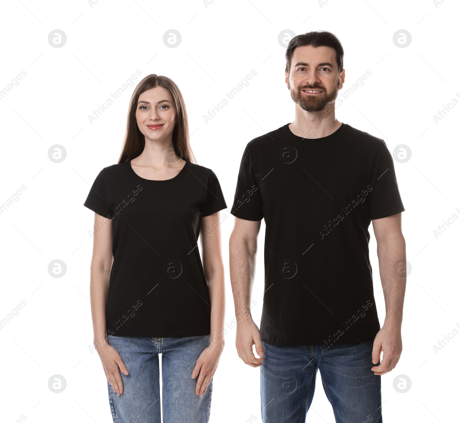 Photo of Woman and man wearing blank black t-shirts on white background. Mockup for design