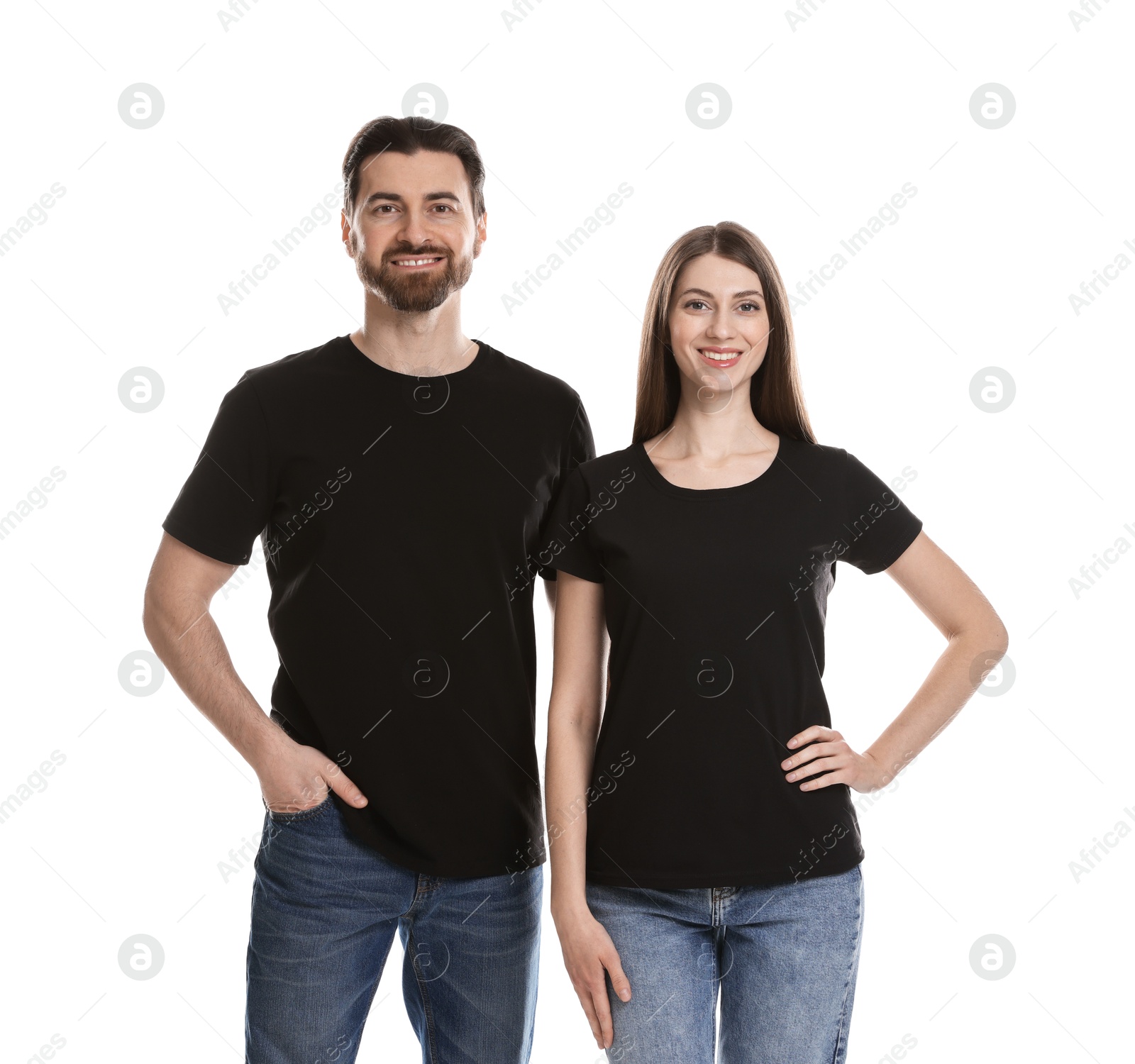 Photo of Woman and man wearing blank black t-shirts on white background. Mockup for design