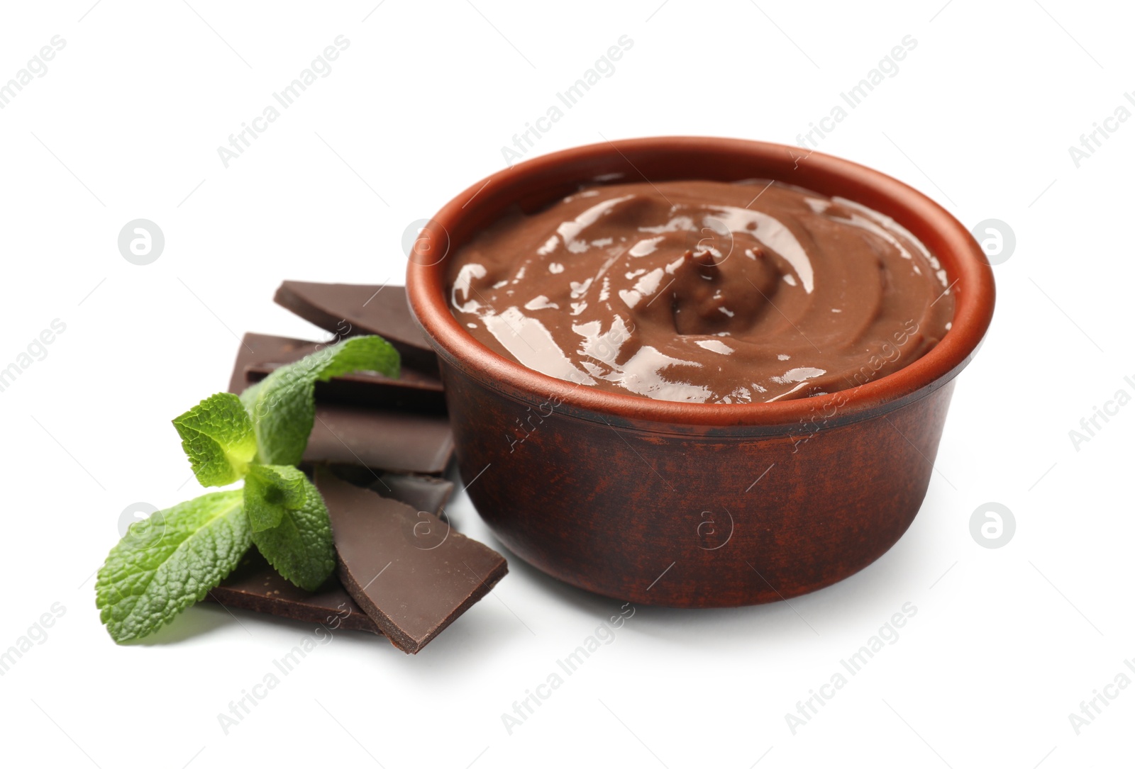 Photo of Tasty pudding with mint and pieces of chocolate isolated on white