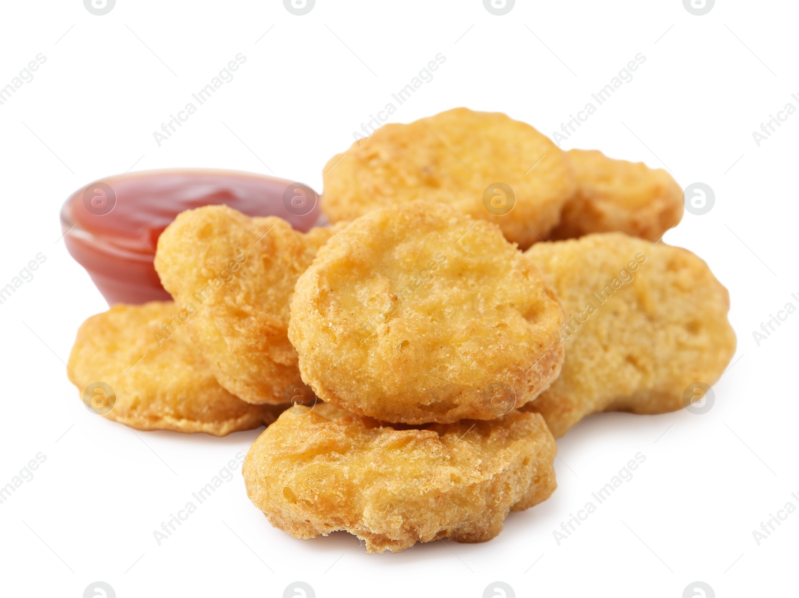 Tasty chicken nuggets with sauce isolated on white Photo of Tasty chicken nuggets with sauce isolated on white