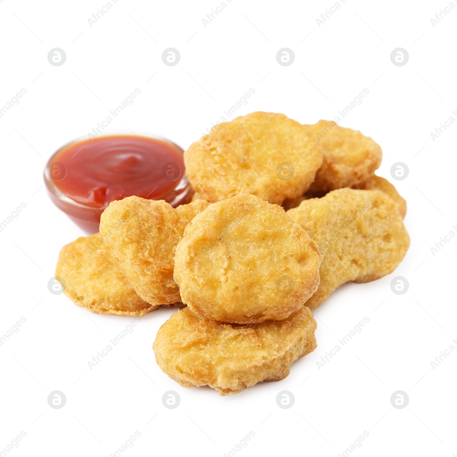Tasty chicken nuggets with sauce isolated on white Photo of Tasty chicken nuggets with sauce isolated on white
