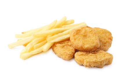 Photo of Tasty chicken nuggets and french fries isolated on white