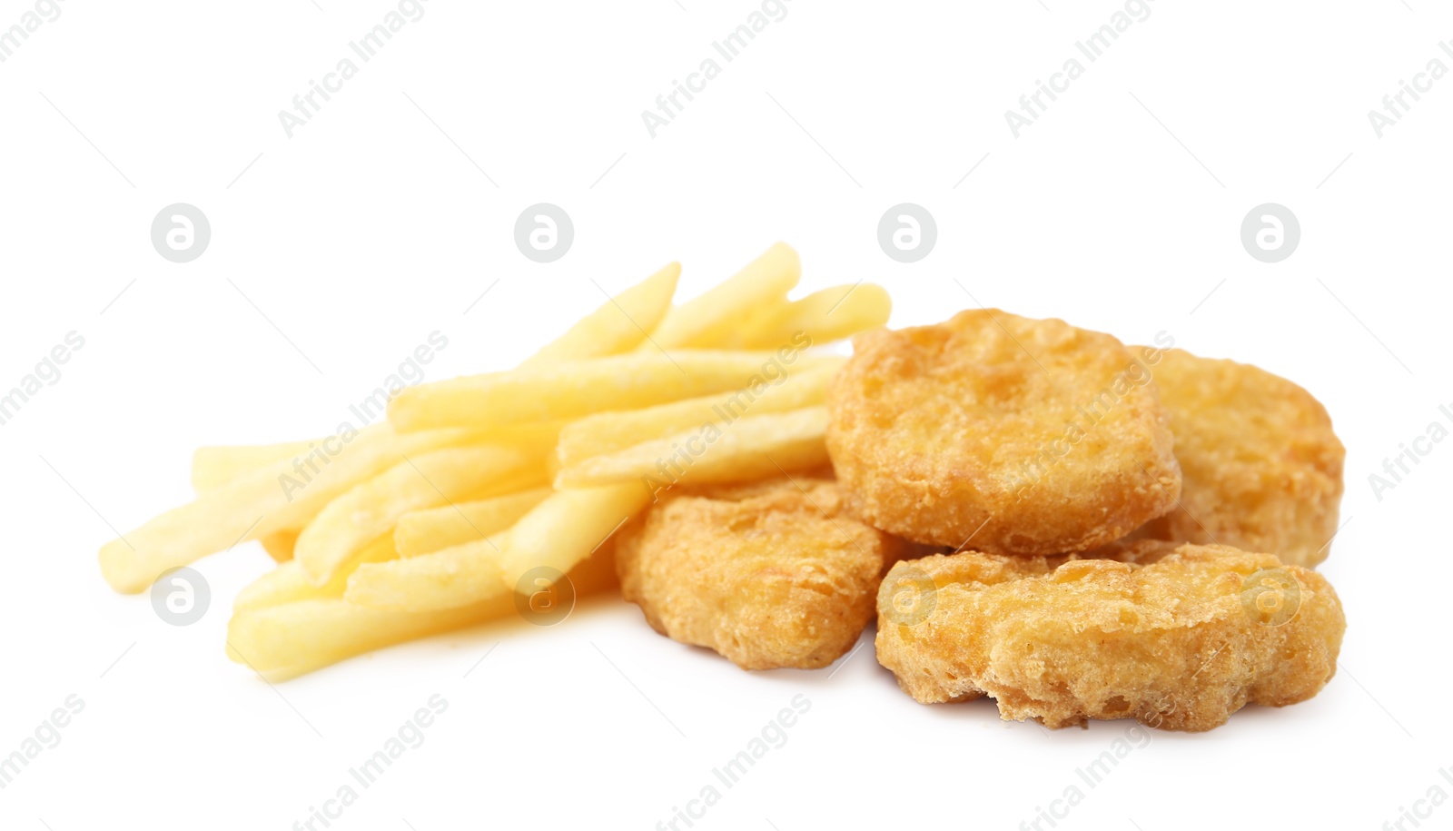 Tasty chicken nuggets and french fries isolated on white Photo of Tasty chicken nuggets and french fries isolated on white
