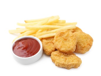 Photo of Tasty chicken nuggets and french fries with sauce isolated on white