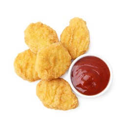 Photo of Tasty chicken nuggets with sauce isolated on white, top view