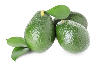 Photo of Whole ripe avocados with green leaves isolated on white