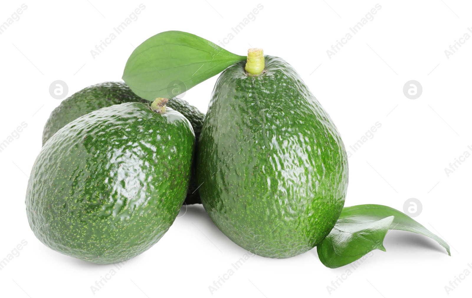 Photo of Whole ripe avocados with green leaves isolated on white