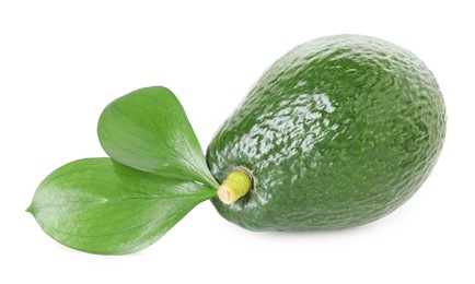 Photo of One whole ripe avocado with green leaves isolated on white