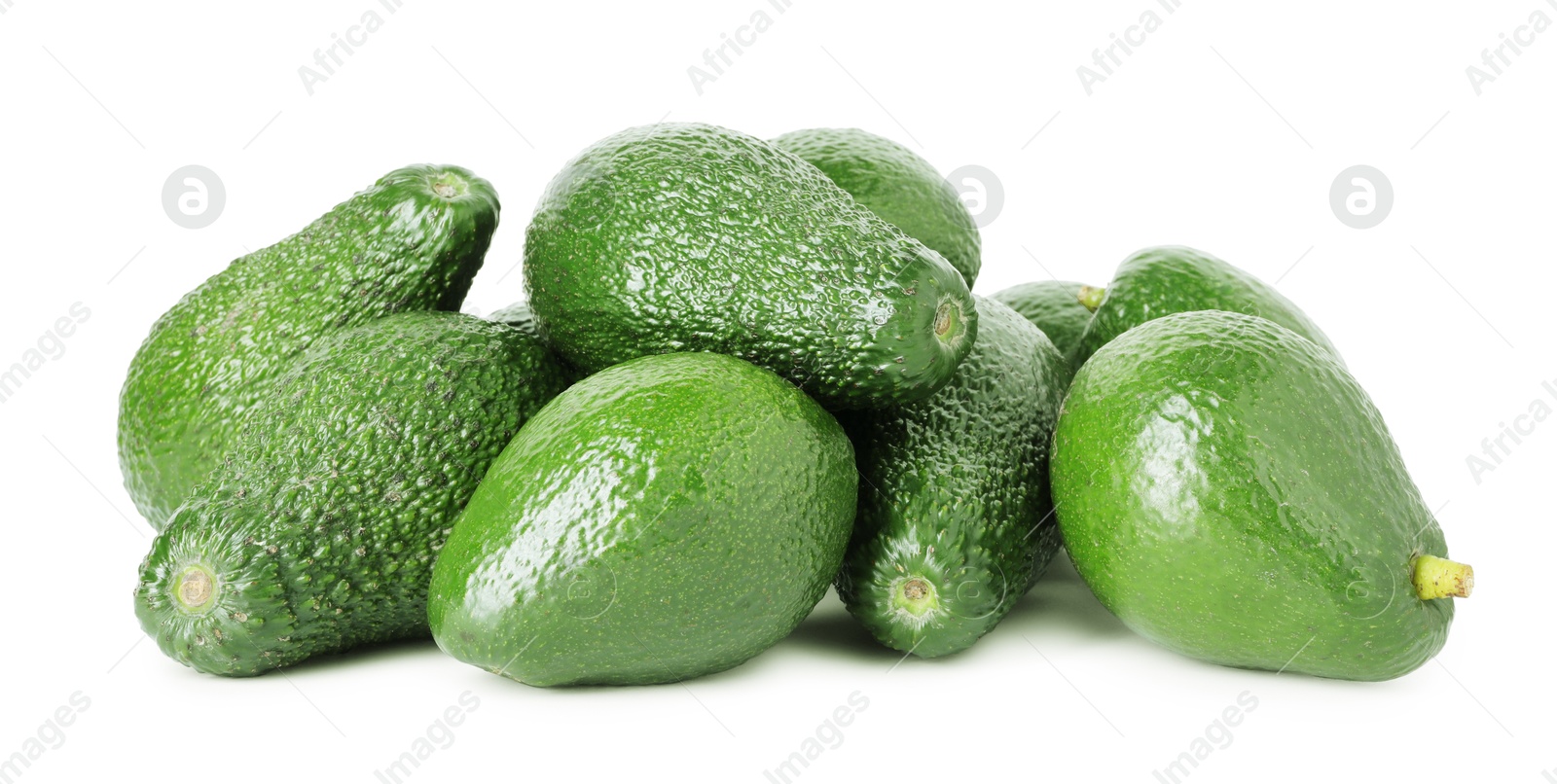 Photo of Pile of whole ripe avocados isolated on white