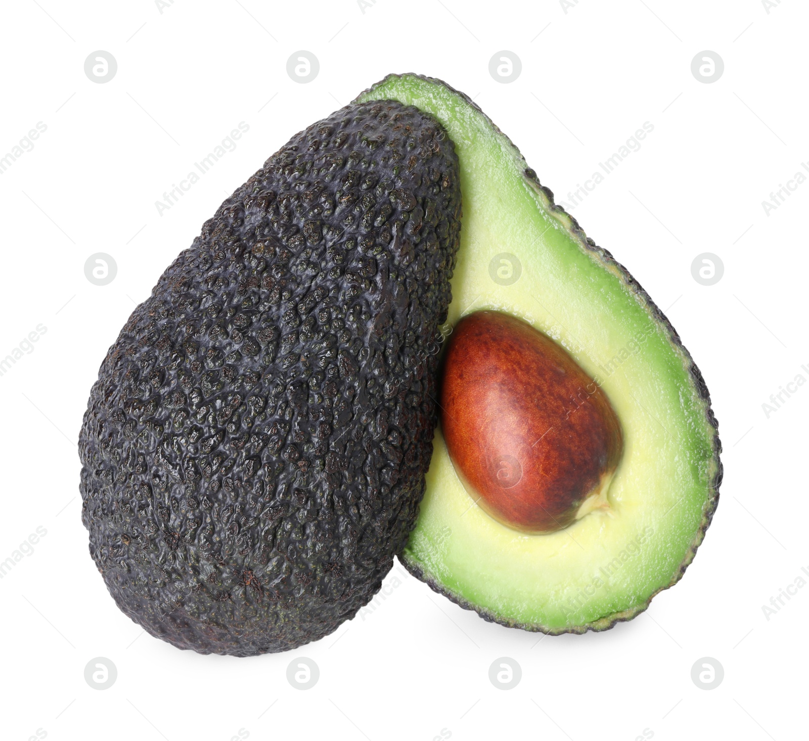 Photo of Halves of ripe avocado isolated on white