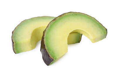 Photo of Slices of ripe avocado isolated on white