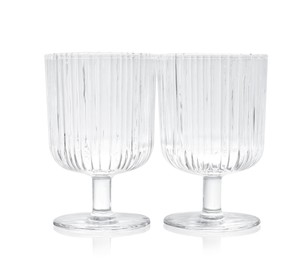 Photo of Two empty clean glasses isolated on white