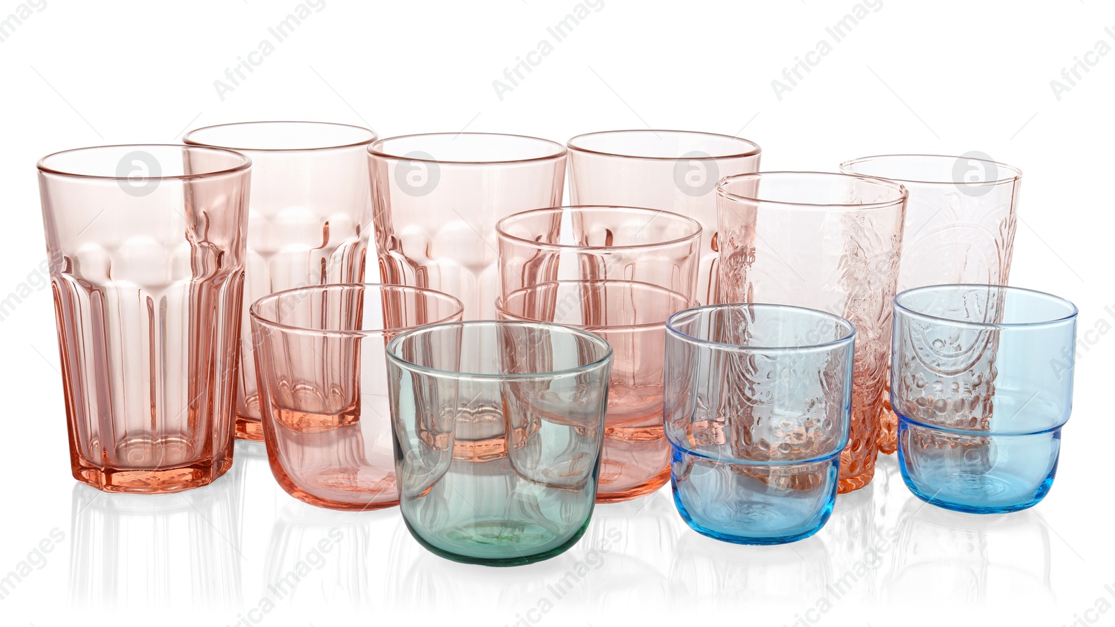 Photo of Many empty clean glasses isolated on white