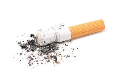 Photo of One cigarette butt isolated on white. Smoking habit