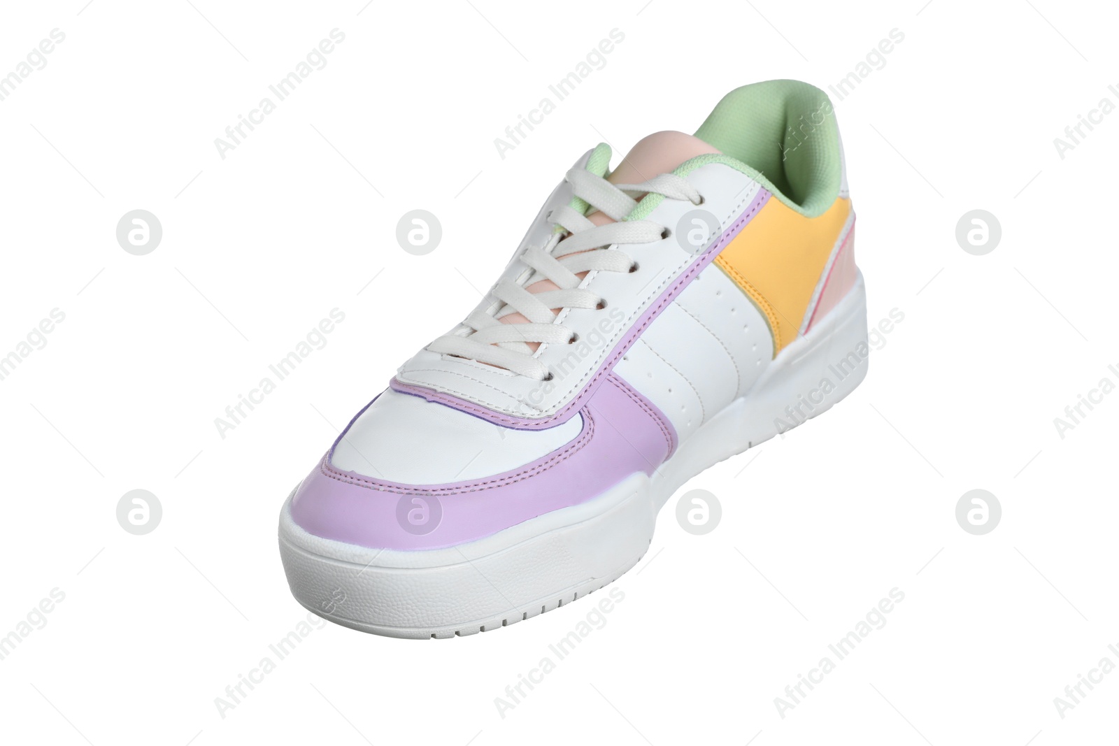 Photo of One colorful sneaker in air isolated on white