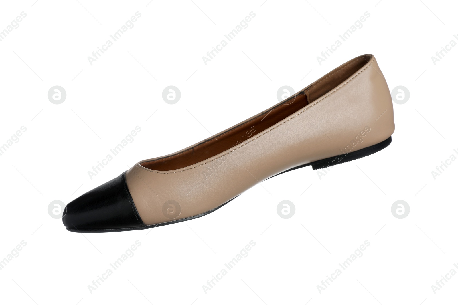 Photo of One ballet flat in air isolated on white