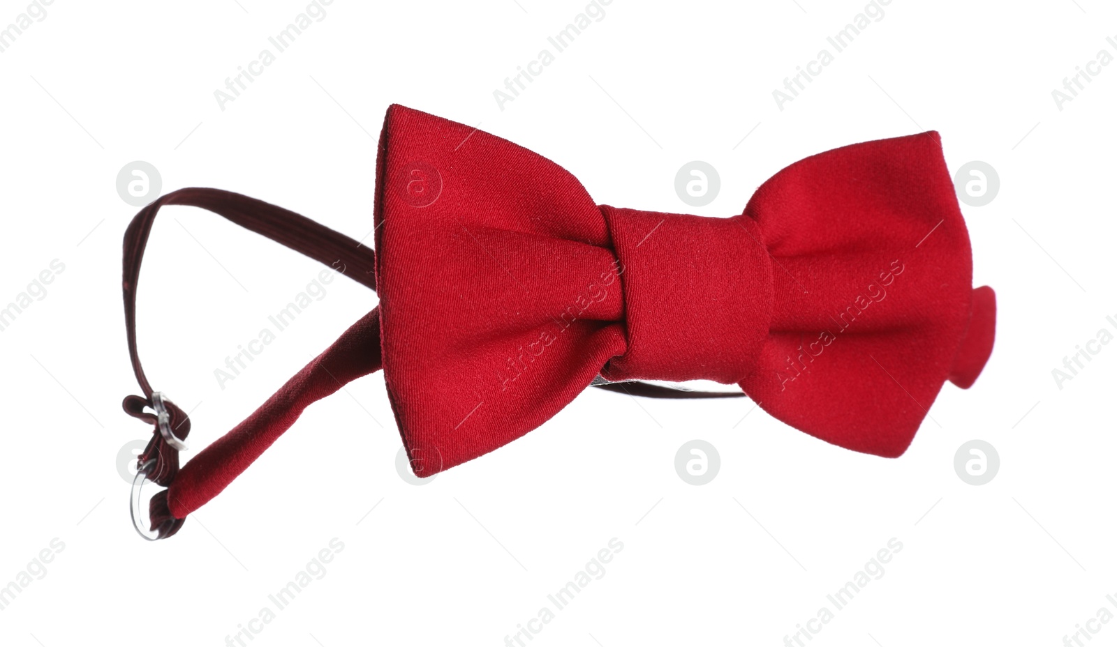 Photo of Stylish red bow tie in air isolated on white