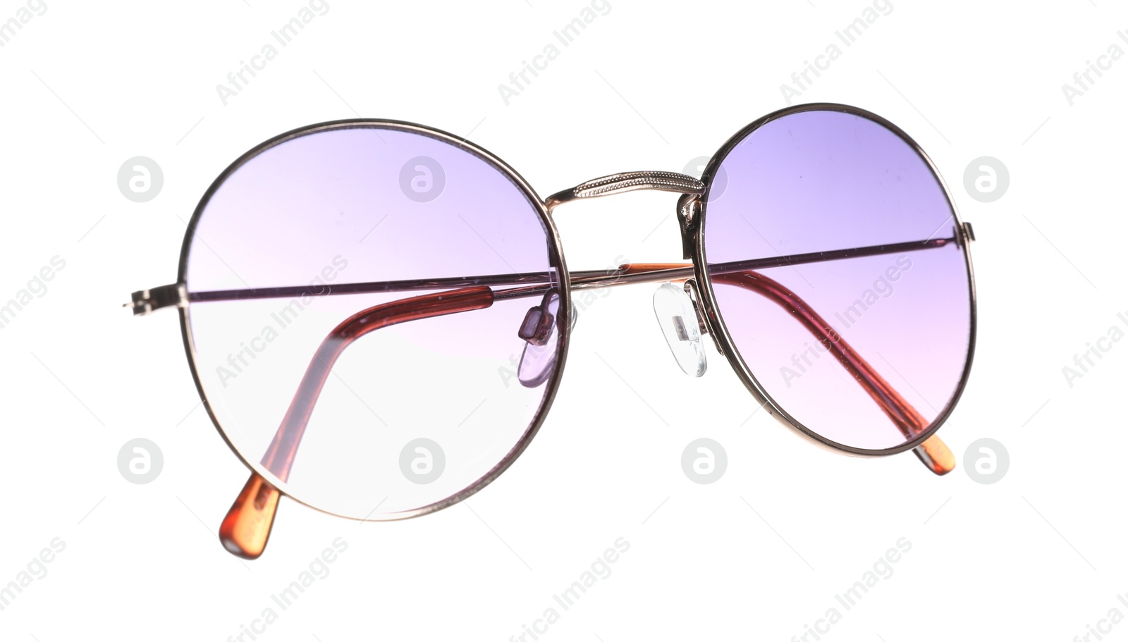 Photo of Stylish sunglasses in air isolated on white