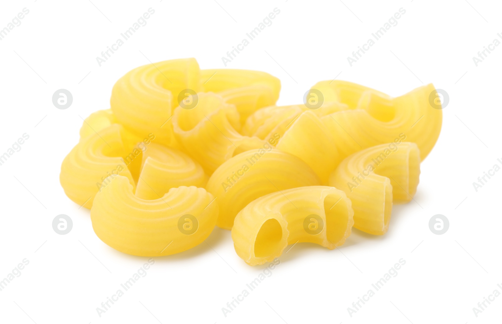 Photo of Pile of raw horns pasta isolated on white