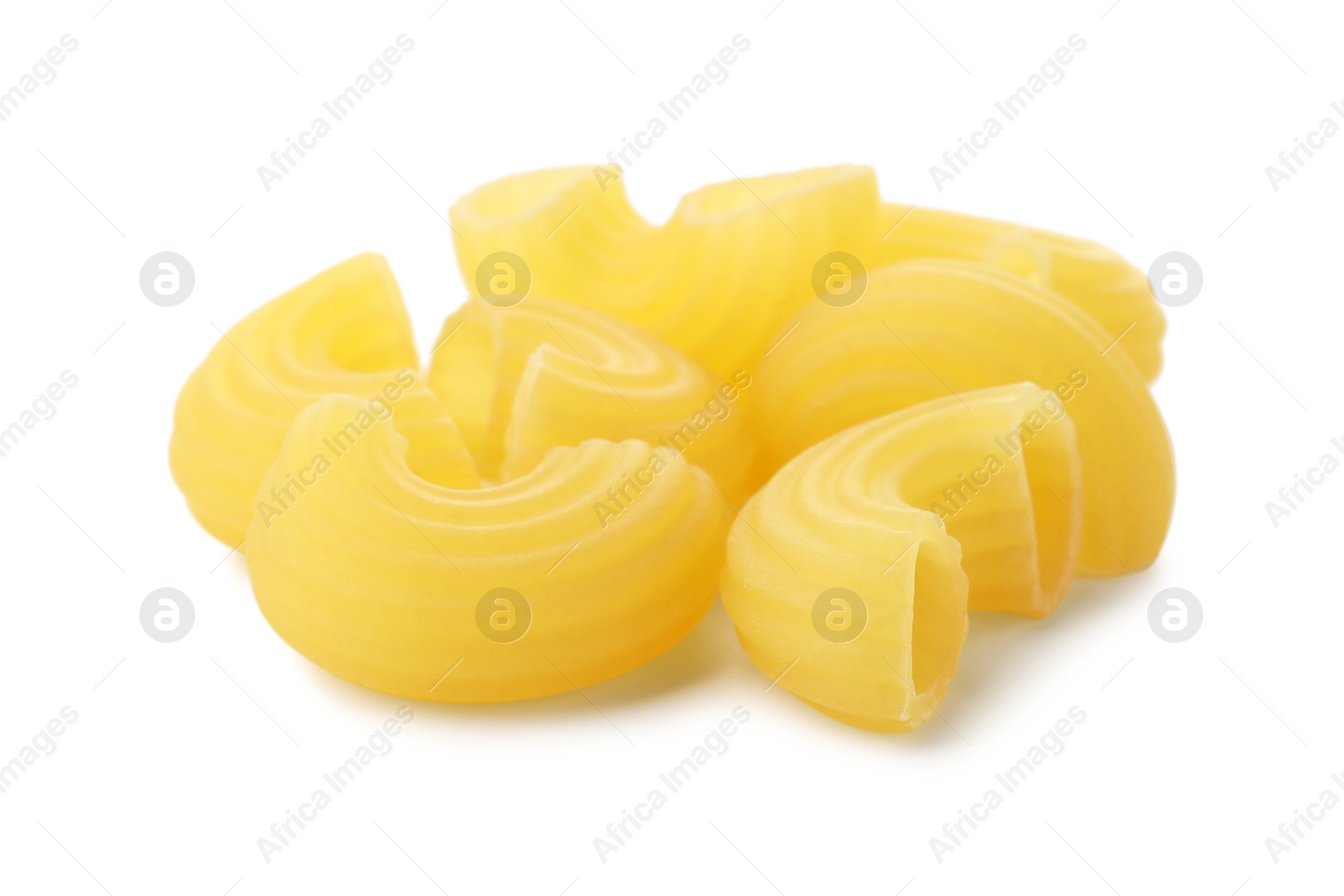 Photo of Pile of raw horns pasta isolated on white