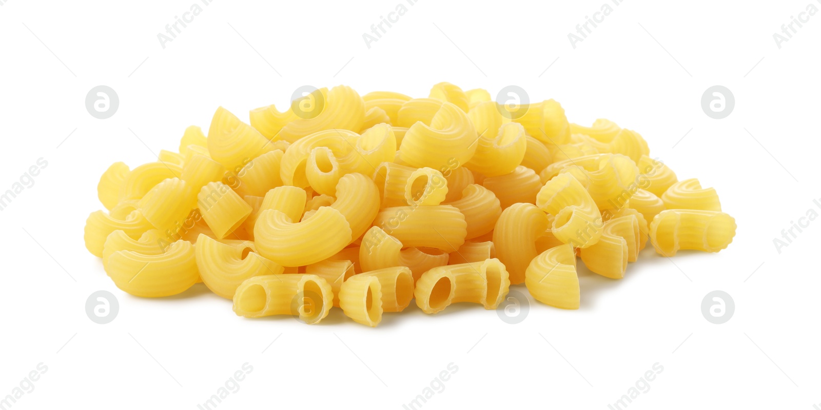 Photo of Pile of raw horns pasta isolated on white