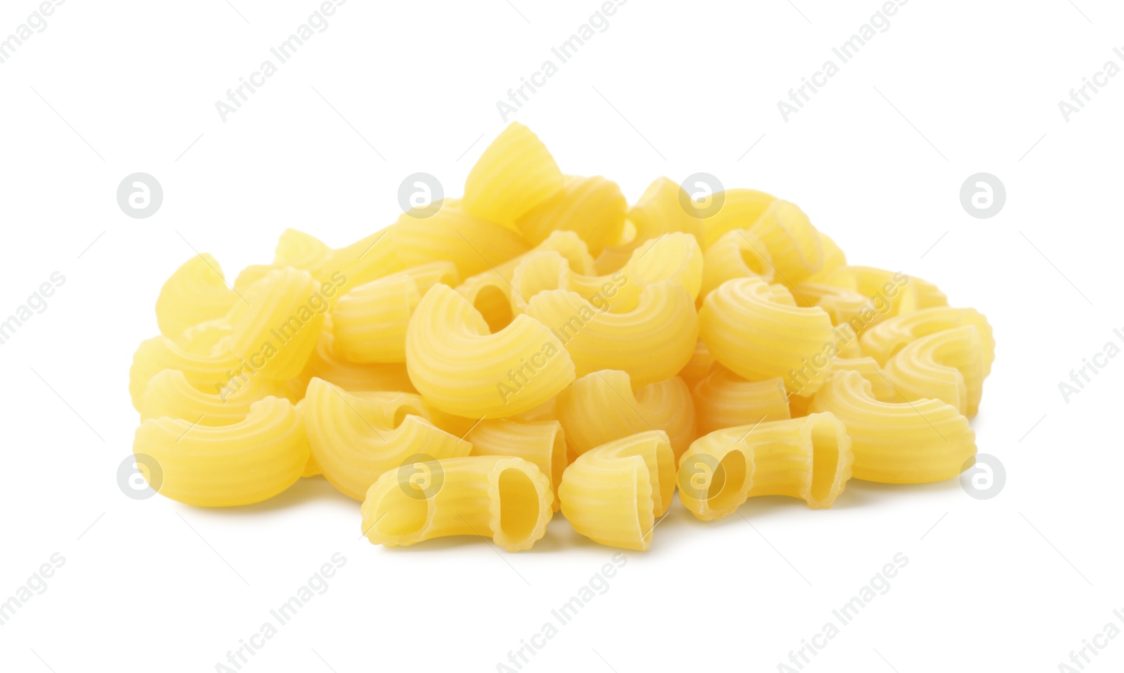 Photo of Pile of raw horns pasta isolated on white